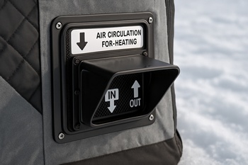 Open vent near the roof of an ice shelter with frost around it
