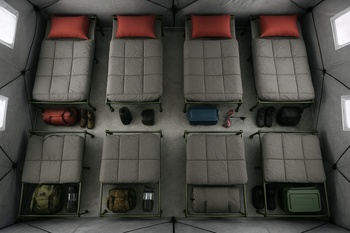 Top view of bunks, stove and gear path inside a small shelter