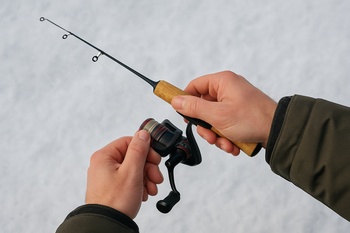 Top view of a marked auger handle showing preferred grip zone