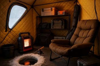Interior of a compact ice shelter with neatly organized equipment